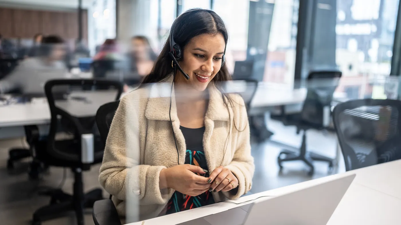 Young woman working in a call center.