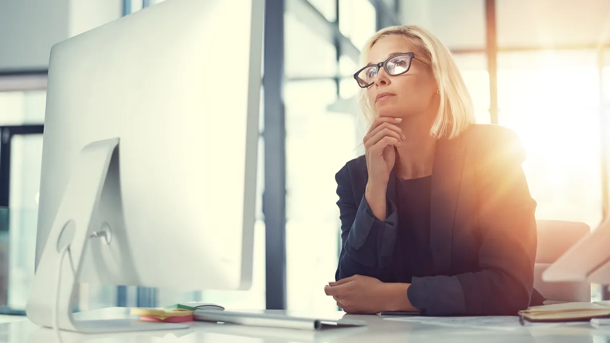 Businesswoman working at her desk