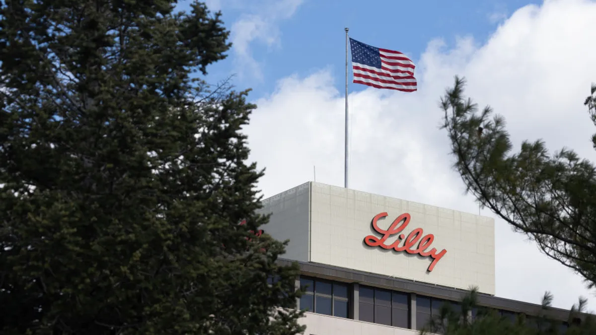 Eli Lilly headquarters exterior with American flag flying