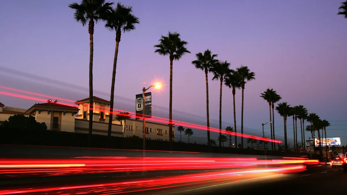 palm trees line Melrose Avenue in Los Angeles.