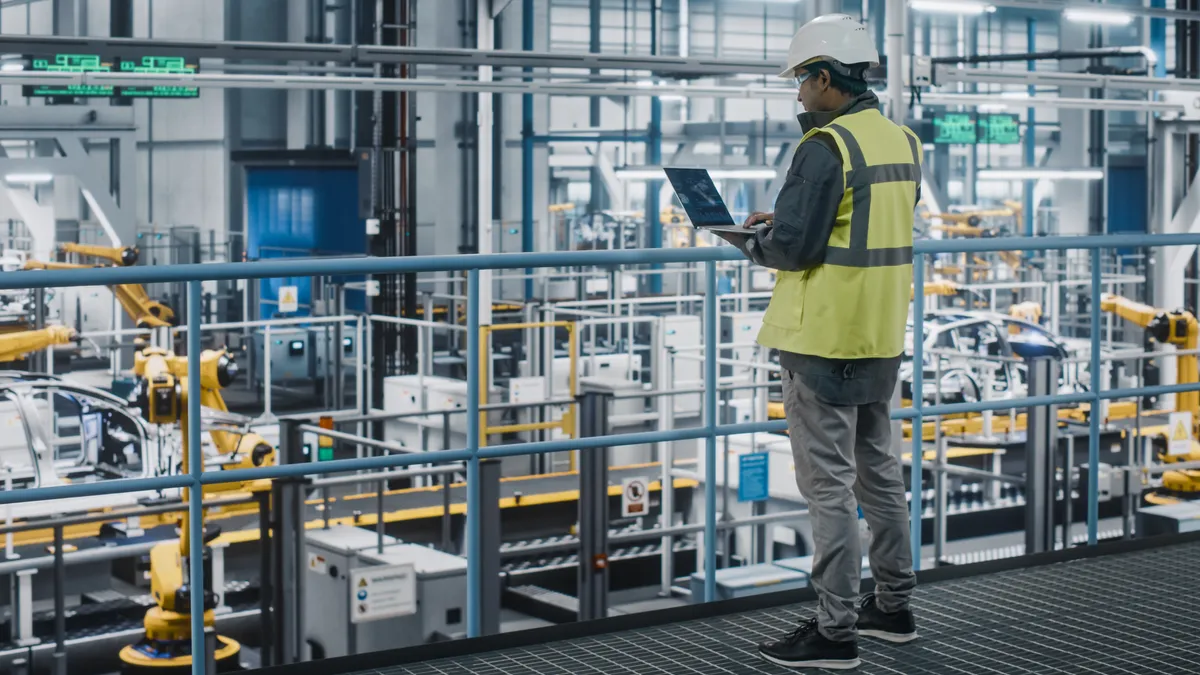 Person looking at manufacturing floor