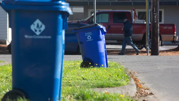 Blue recycling bins are seen on a residential street Oct. 30, 2017, in Portland, Oregon.