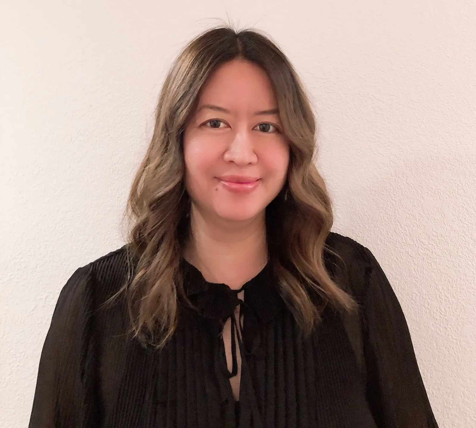 Headshot of Judy Chan, chief marketing officer at Bluedot