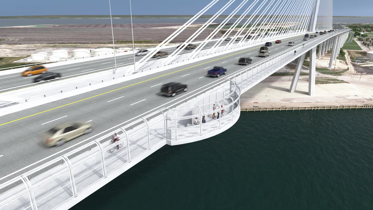 Cars whiz across a white, double-span bridge.