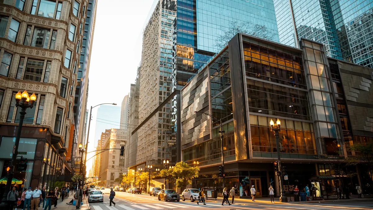 In the USA, Chicago, Illinois features the Chicago River, glass and steel buildings, with skyscrapers in the background, and downtown riversid
