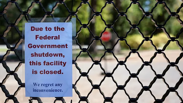 A sign on the entrance to the U.S. National Arboretum says it is closed.