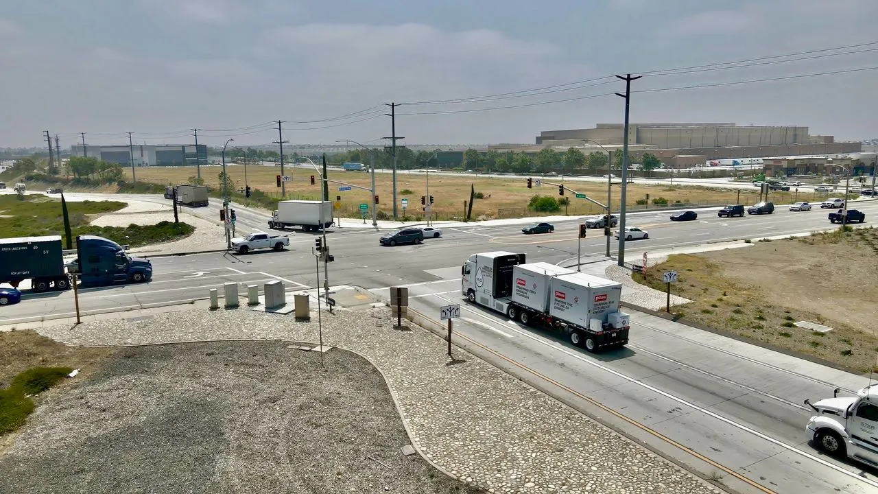 Pilot's hydrogen fuel cell truck in the NACFE study at a California intersection, with trucks and passenger cars also present.