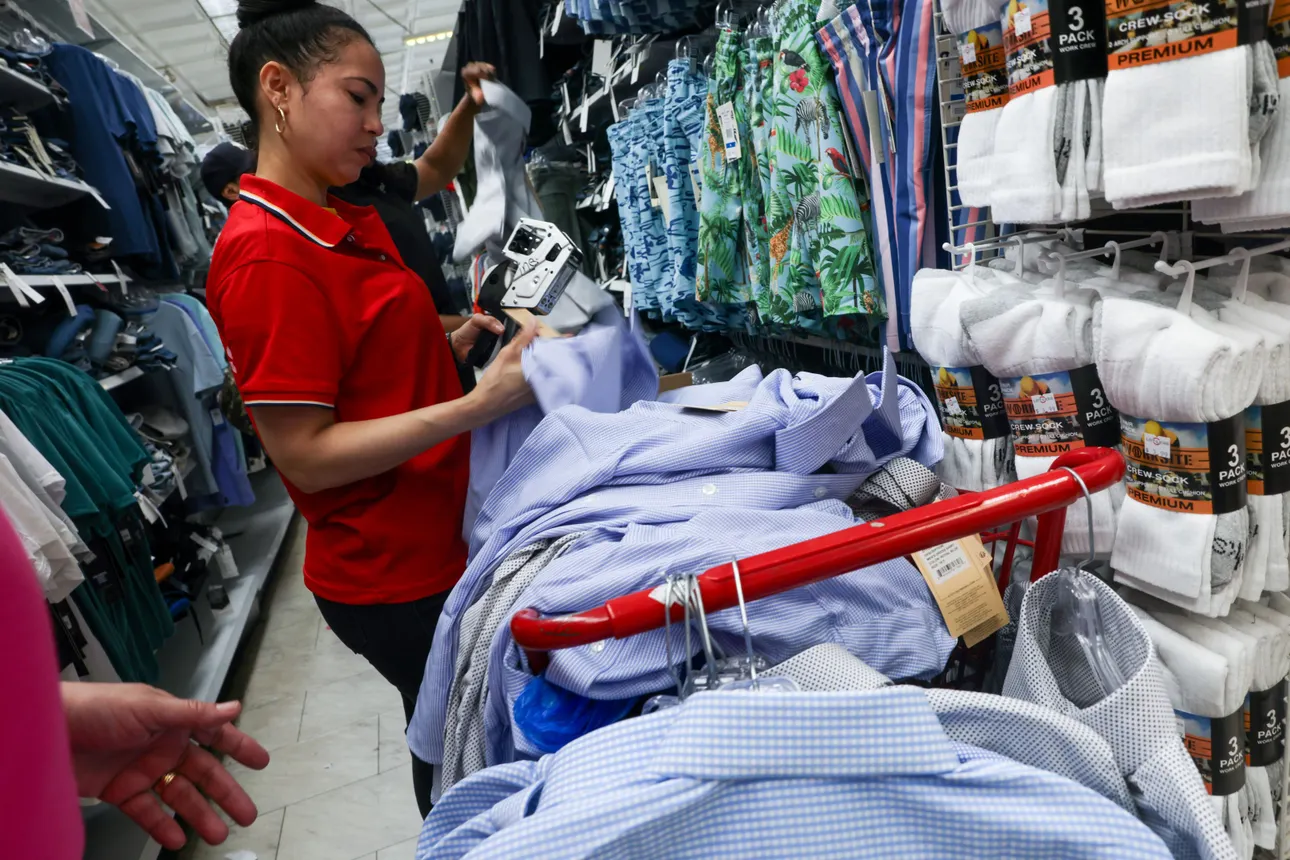 A worker prices items at a retail store on July 15, 2025, in New York City.