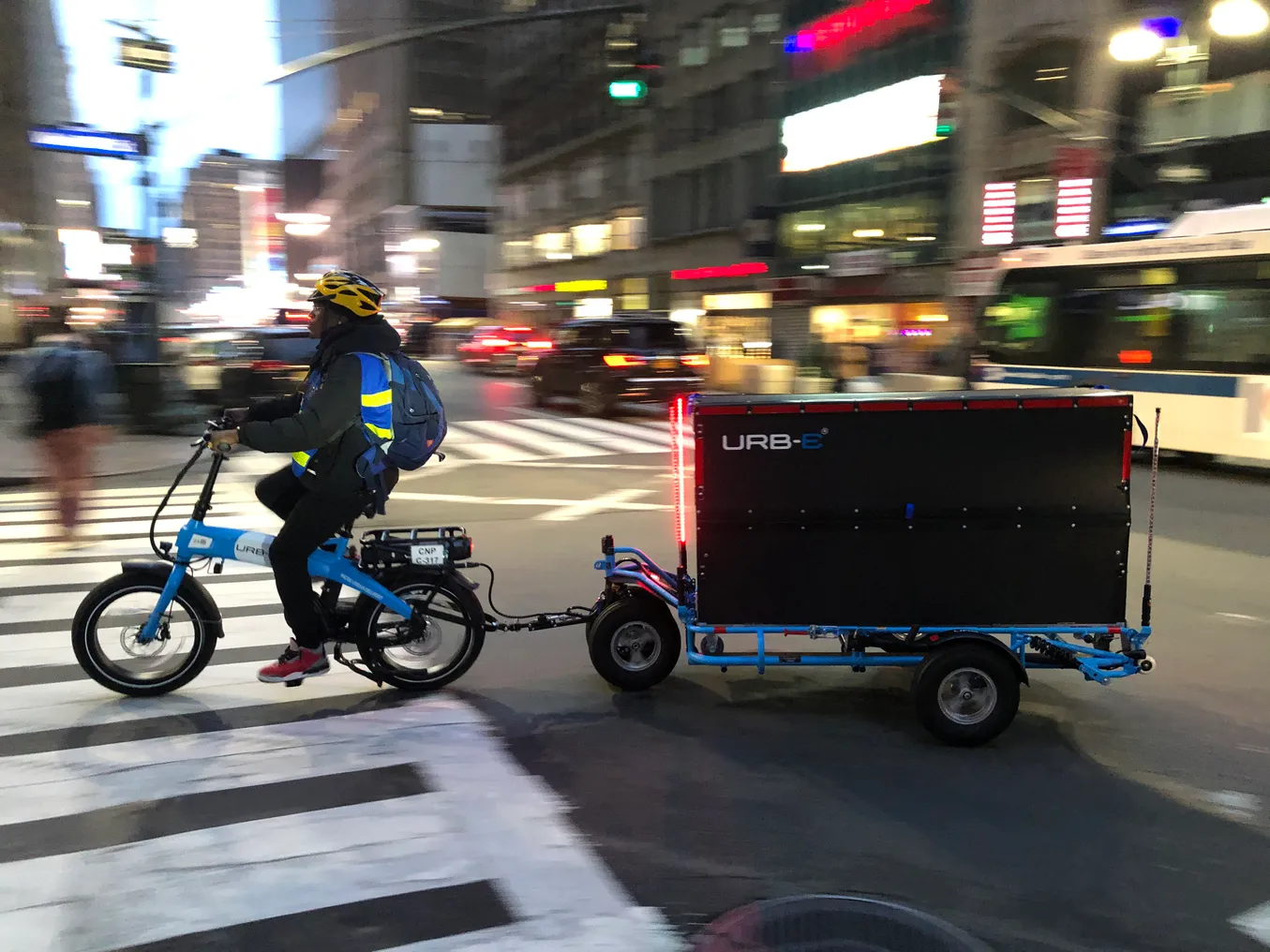 URB-E electric bicycle and container on city street