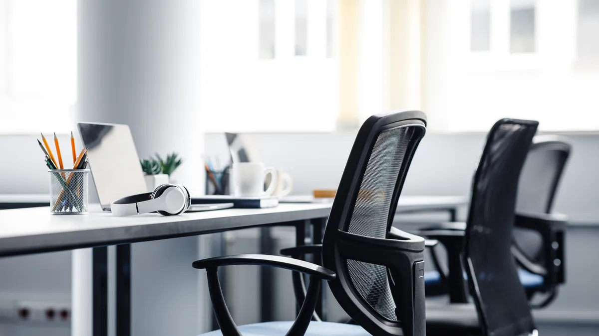 A desk inside an office.