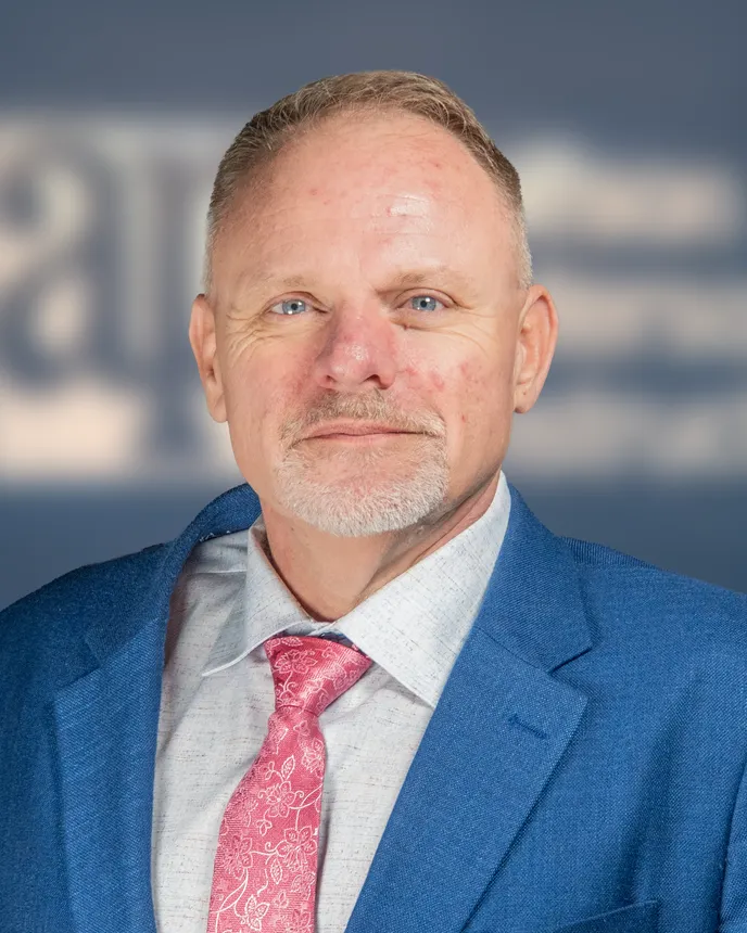 A headshot of Brad Hendrickson