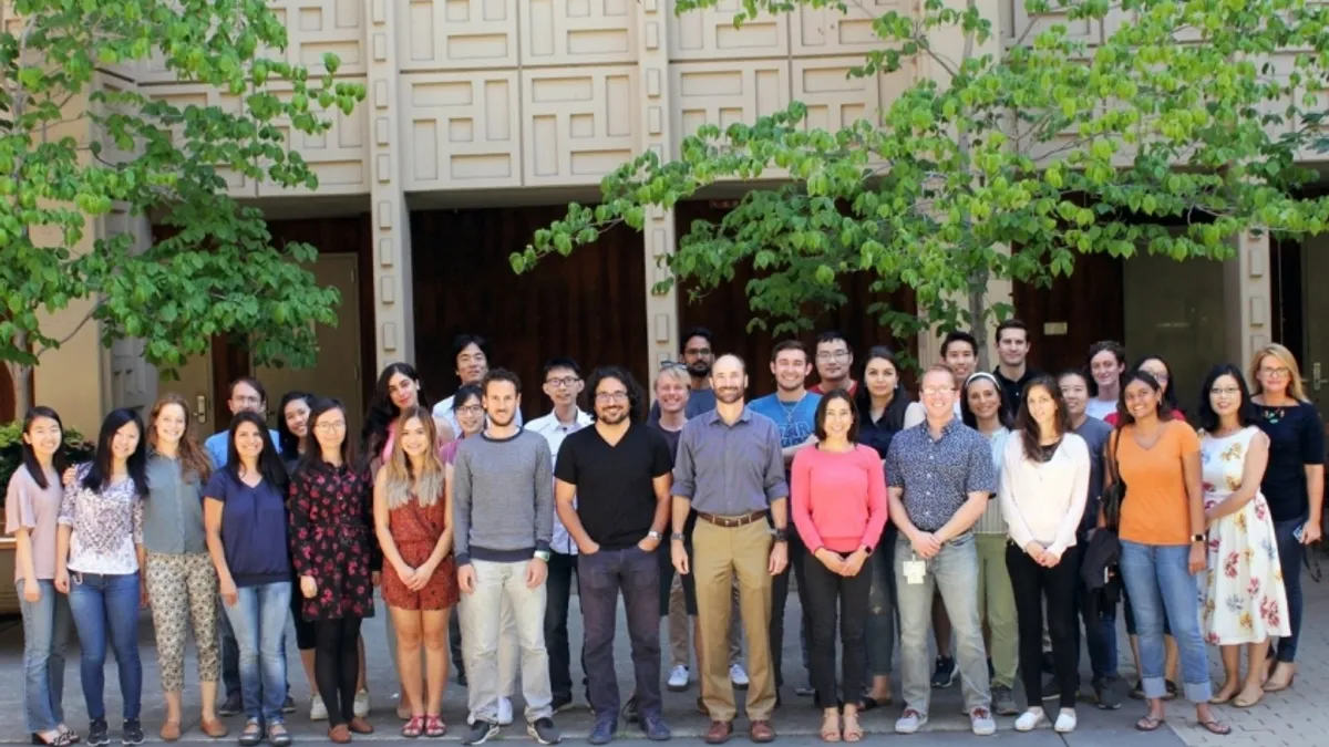 Michael Snyder and his lab team at Stanford in a group photo