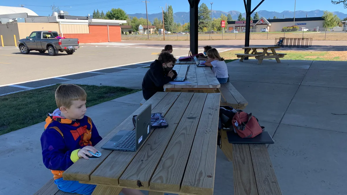 Students in the Evergreen School District #50 in Kalispell, Montana, attend a class outside.