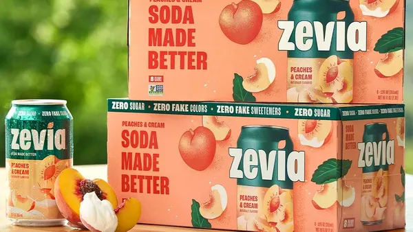 A case of Zevia soda, with a can outside of the case.
