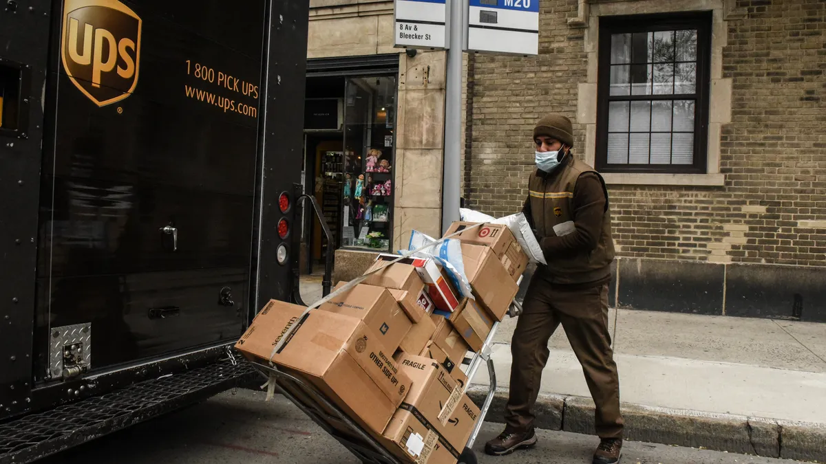 A United Parcel Service worker delivers packages on April 29, 2020 in New York City.