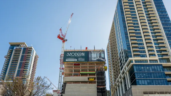 Mixed-use housing and office properties undergo construction