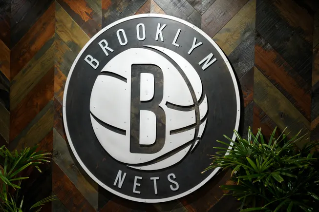 Ex-VP for NBA’s Brooklyn Nets claims he was fired for taking parental leave