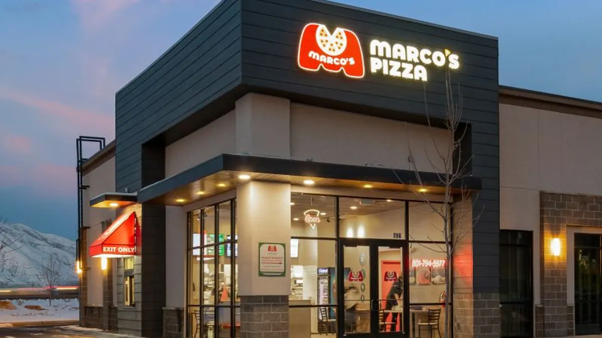 An evening image of Marco's Pizza