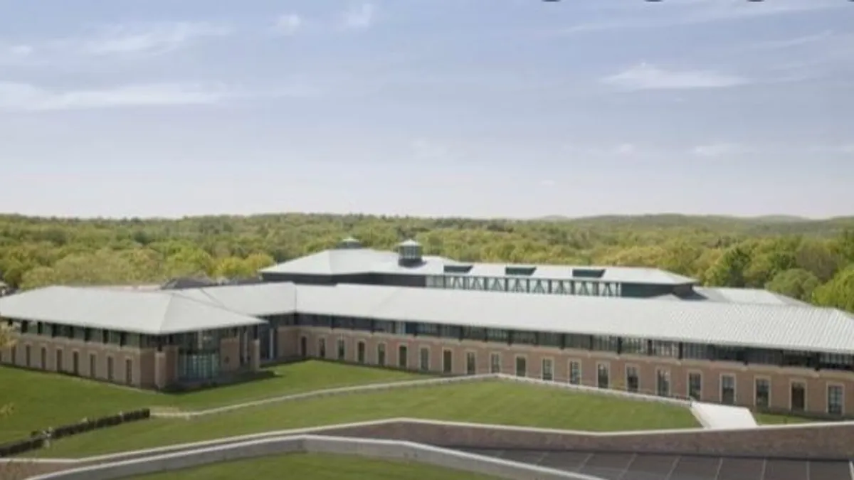 Becton Dickinson's headquarters, viewed from overhead, are surrounded by a green lawn.