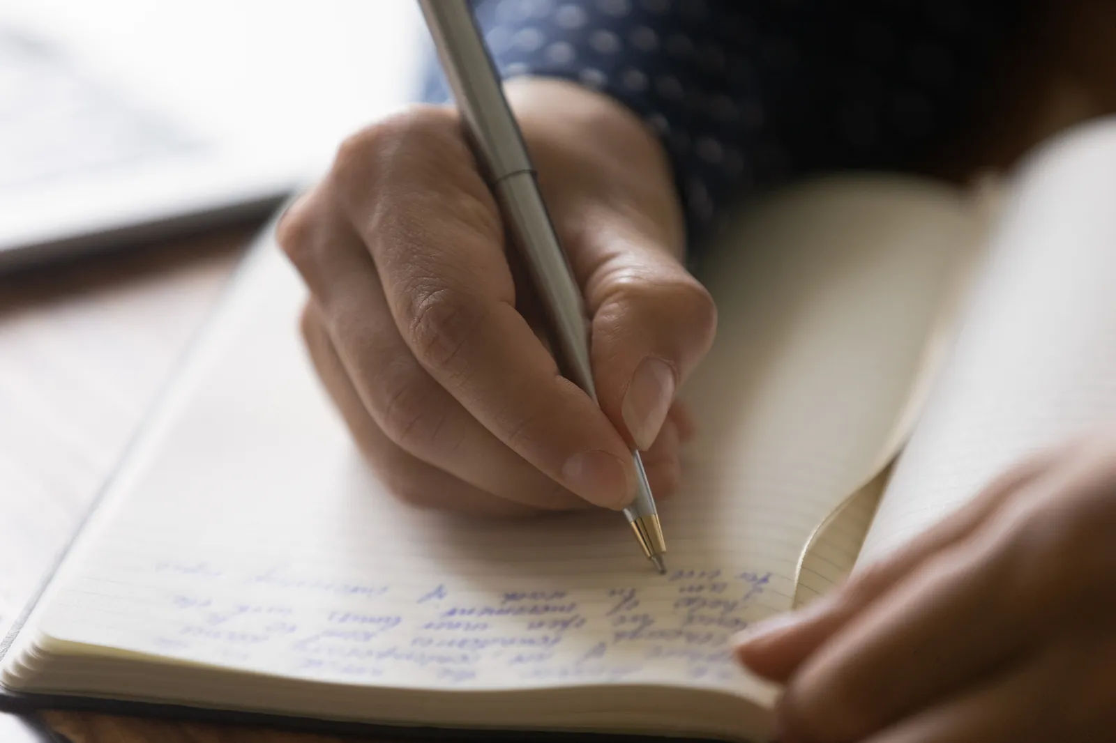 Close up of a person journaling