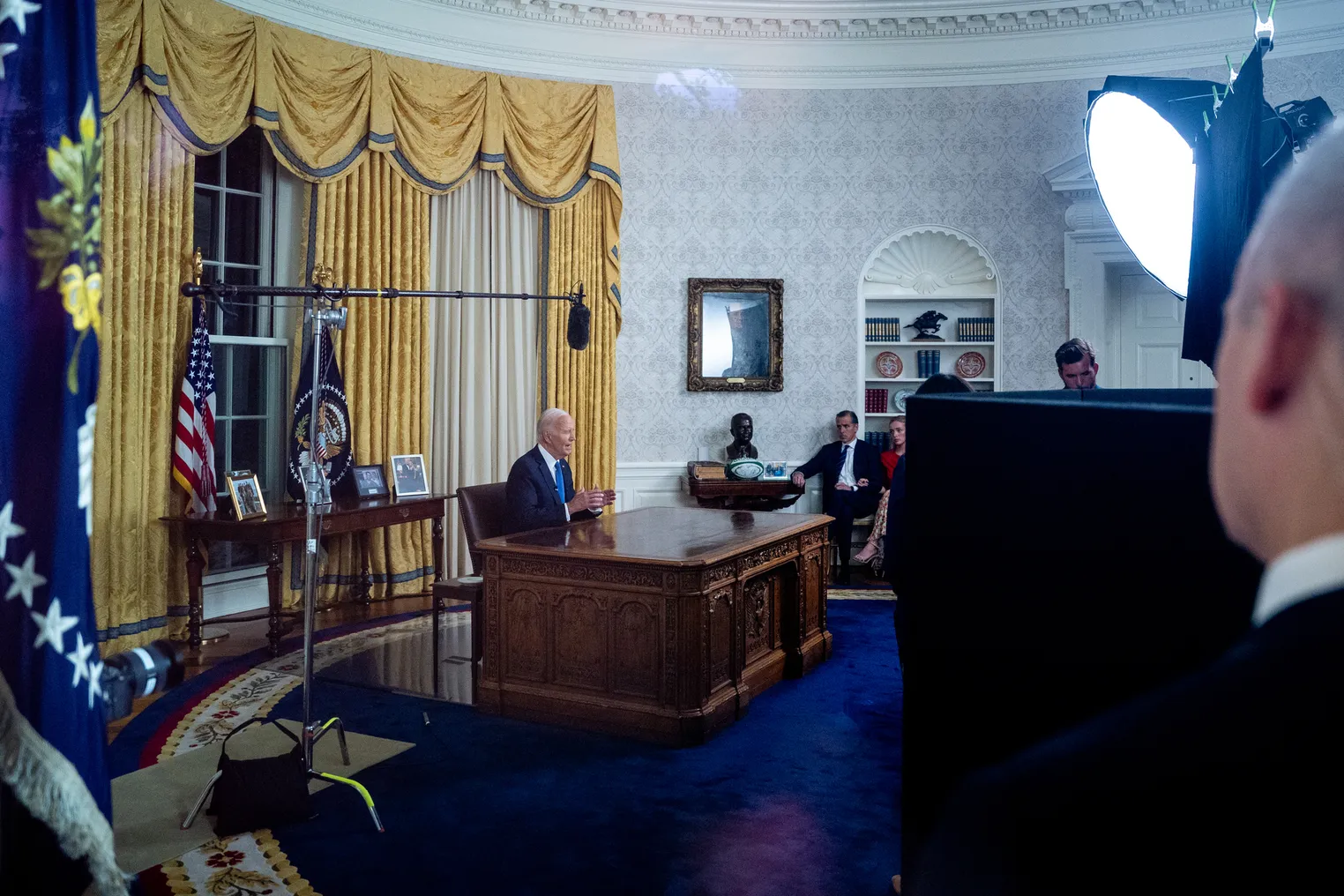 Image of President Biden sitting at his desk in the Oval Office on July 24 addressing the nation about his decision to not seek reelection.