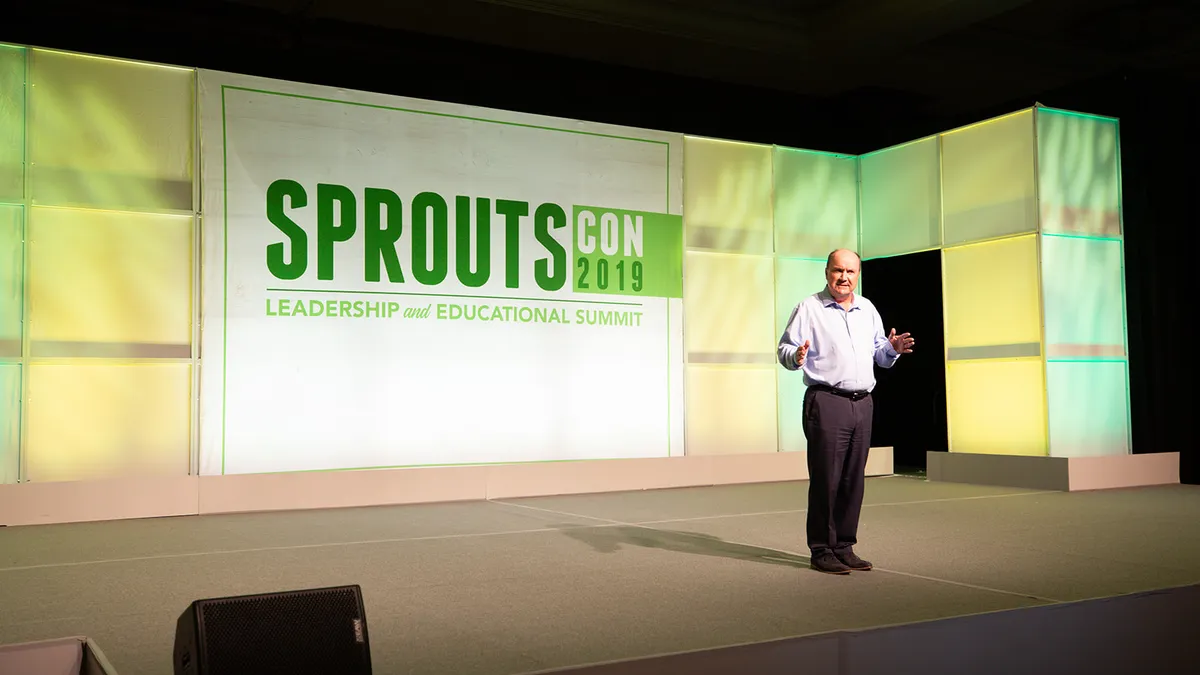 Sprouts CEO Jack Sinclair on stage at SproutsCon 2019