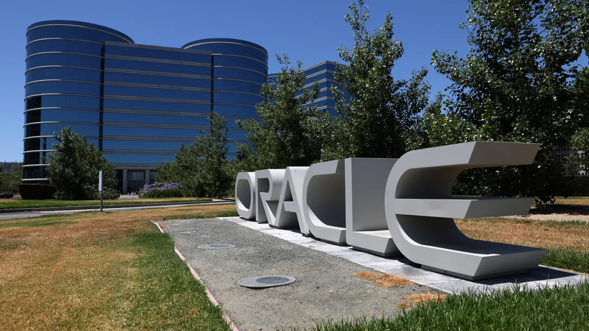 A sign is posted in front of Oracle headquarters on June 13, 2022 in Redwood Shores, California.