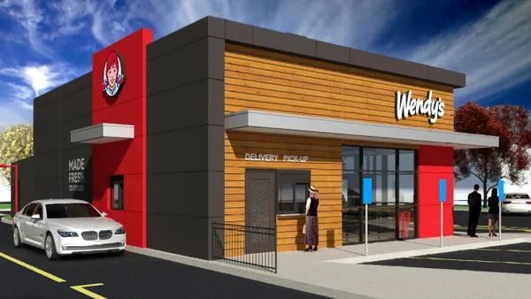 Wendy's Global Next Gen store design features a pick-up window for delivery orders and in-store shelving for digital pick-up orders.