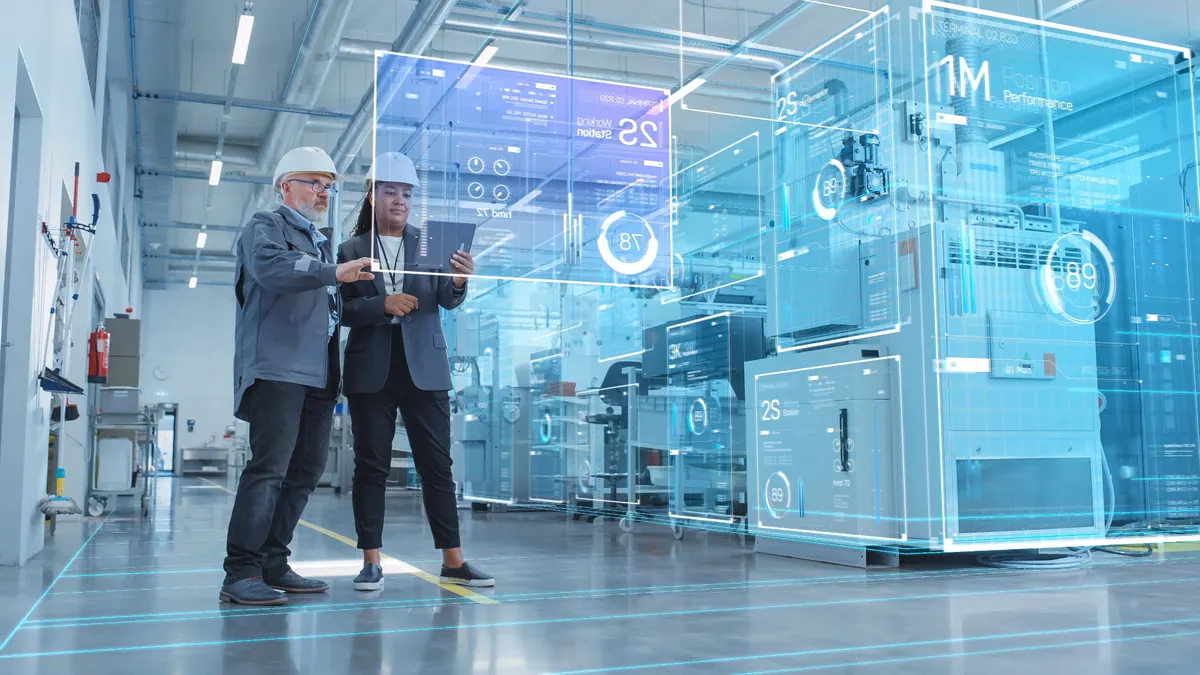 Two Industrial Engineers Using Tablet Computer