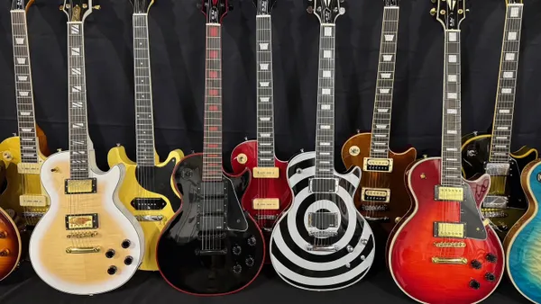 Counterfeit Gibson Les Paul guitars are displayed by U.S. Customs and Border protection officials at a news conference.