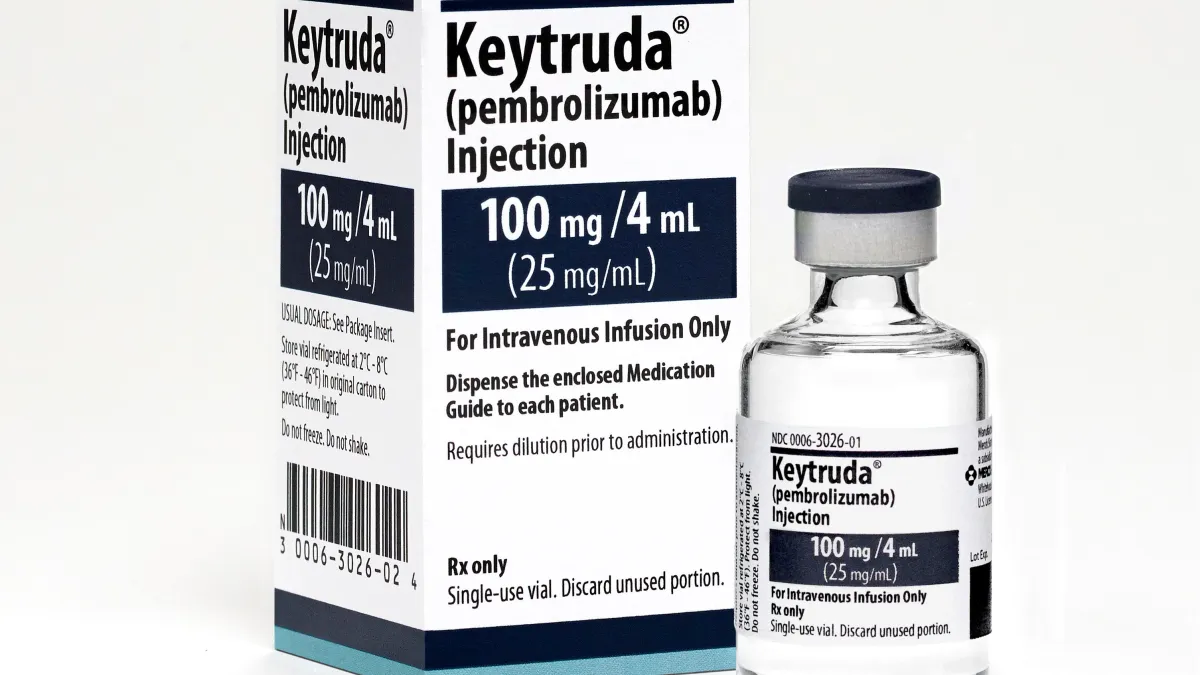 A vial of Merck & Co.'s cancer drug Keytruda next to its box.