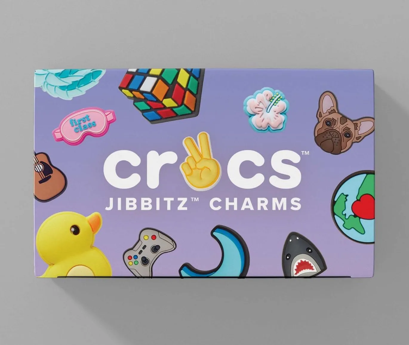 A brightly colored box with a variety of colorful images and Crocs branding.