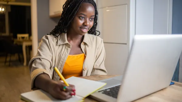 Young woman working from home.