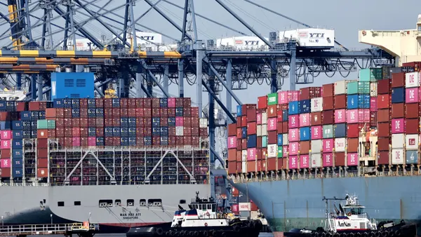 Shipping containers stacked on container ships at the Port of Los Angeles on June 25, 2025.