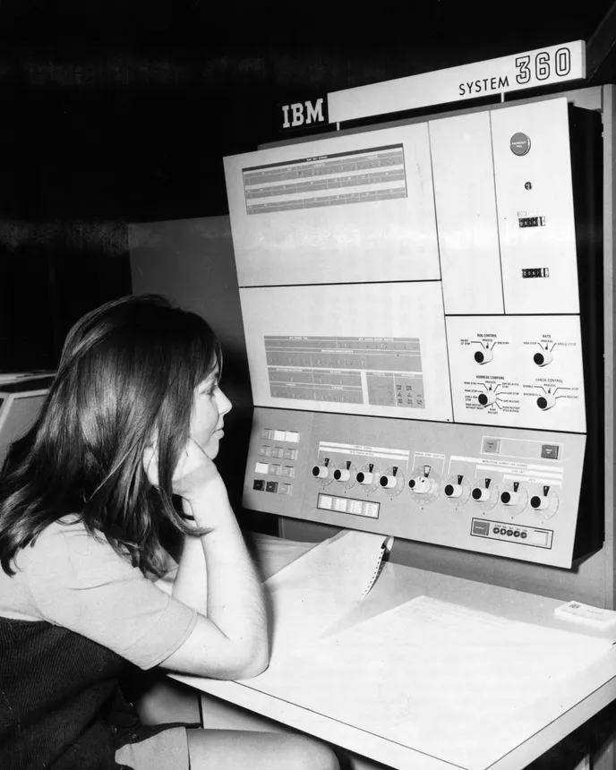 A visitor to the &#x27;Systems &#x27;71&#x27; computer exhibition in Munich, the largest European display of computer technology, watches an IBM System 360 at work.