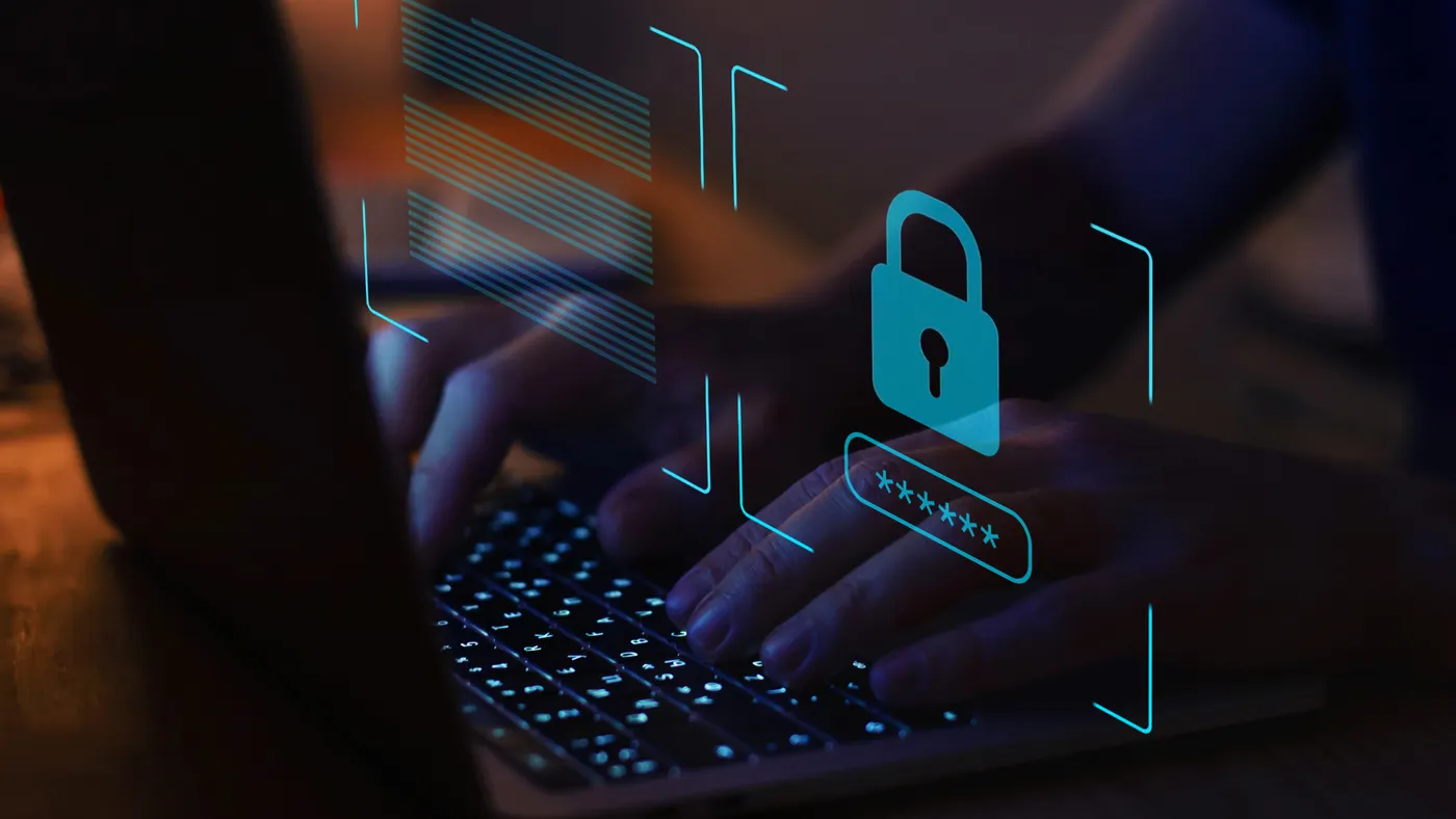 Image depicts the implementation of cybersecurity with a lock displayed over a screen.