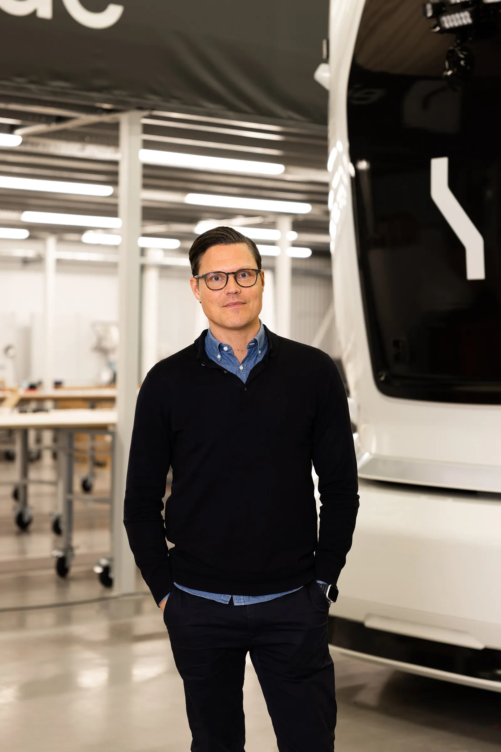 Niklas Reinedahl, North America general manager of Einride, stands next to one of the company&#x27;s vehicles.