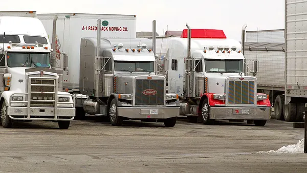 generic trucks parked truck stop getty