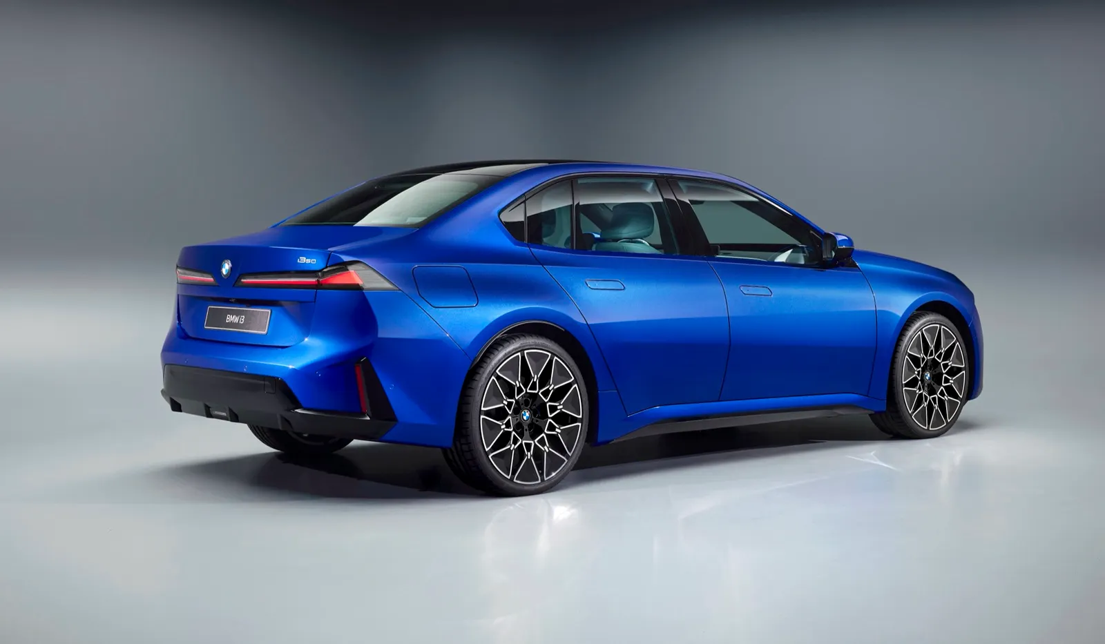 The BMW i3 sedan from the rear angle, as it makes its Munich debut in March 2026