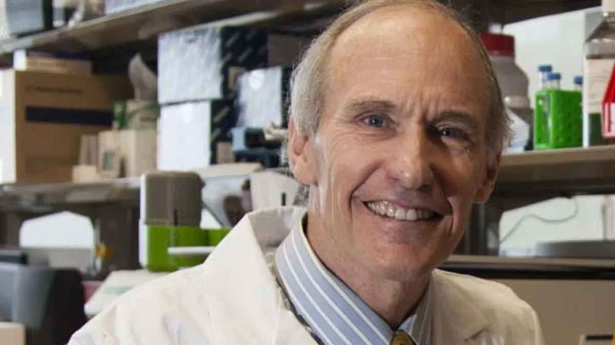 A photo of Carl June in his laboratory at the University of Pennsylvania