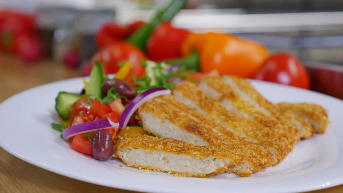 A cell-based chicken patty made by Future Meat Technologies
