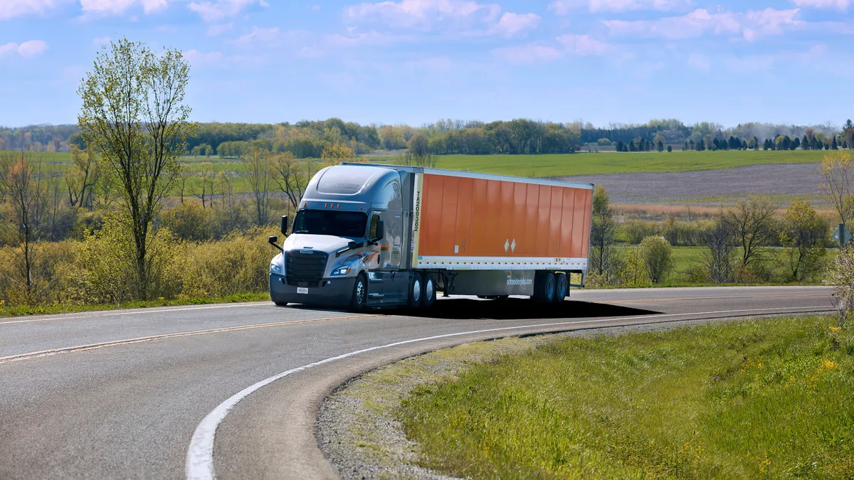 Schneider National truck on rural road