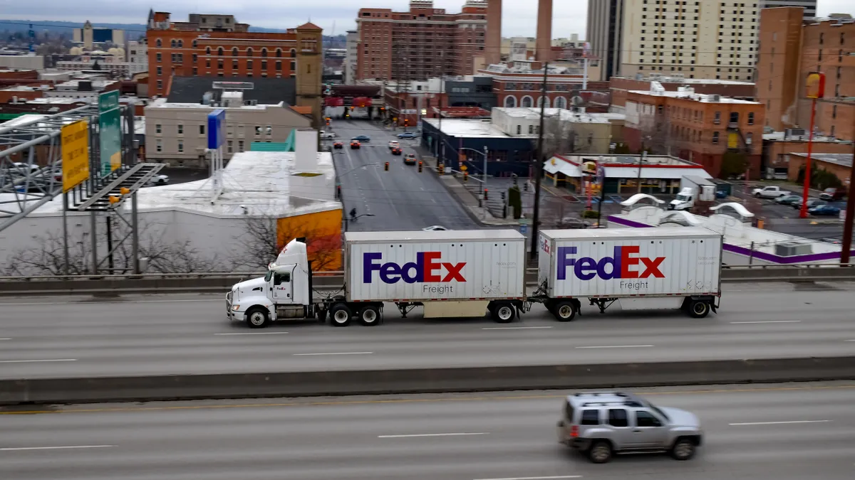 A FedEx Freight truck pulls a double trailer on Interstate 90 in Spokane, Washington, in March 2022.