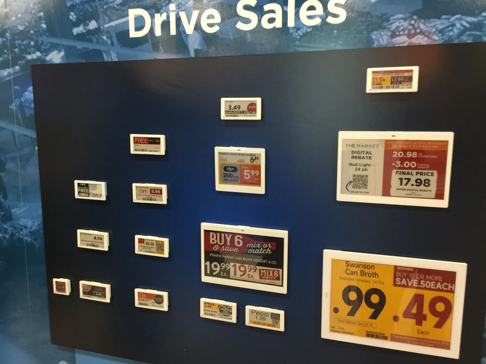 Digital price tags on display in a trade show booth