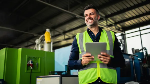 Portrait of a happy manager from the factory.