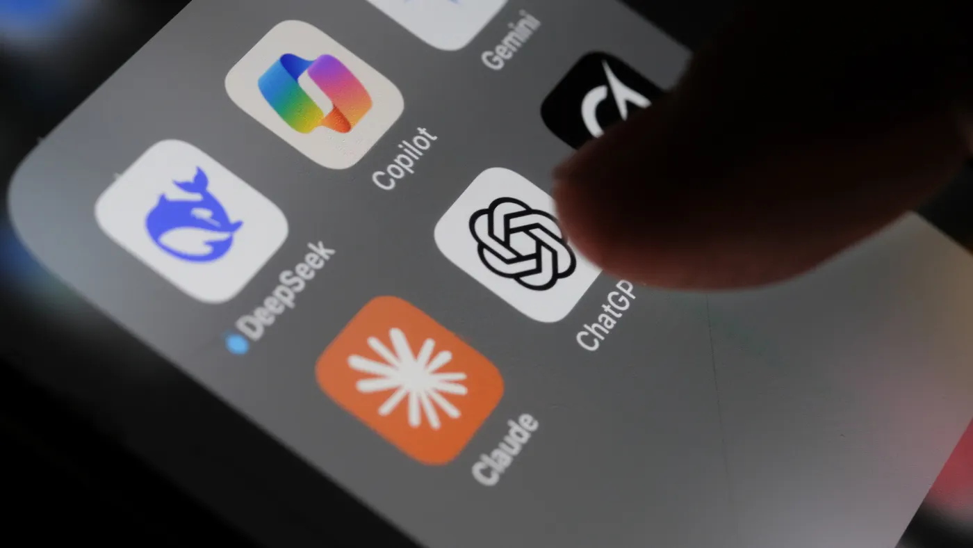 A customer presses the image of the ChatGPT app on their phone.