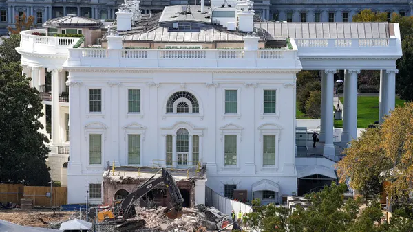 An excavator works to clear rubble after the East Wing of the White House was demolished on October 23, 2025 in Washington, D.C.