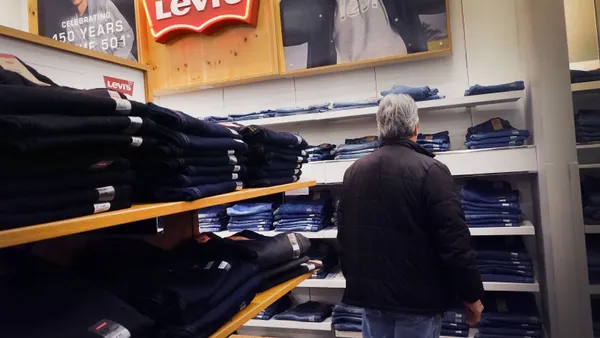 A customer browses Levi's jeans at a store in Chicago on Jan. 29, 2024.
