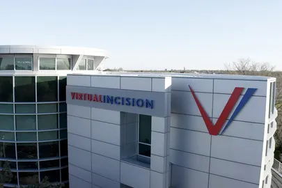 The Virtual Incision headquarters building appears under a blue sky in Lincoln, Nebraska.