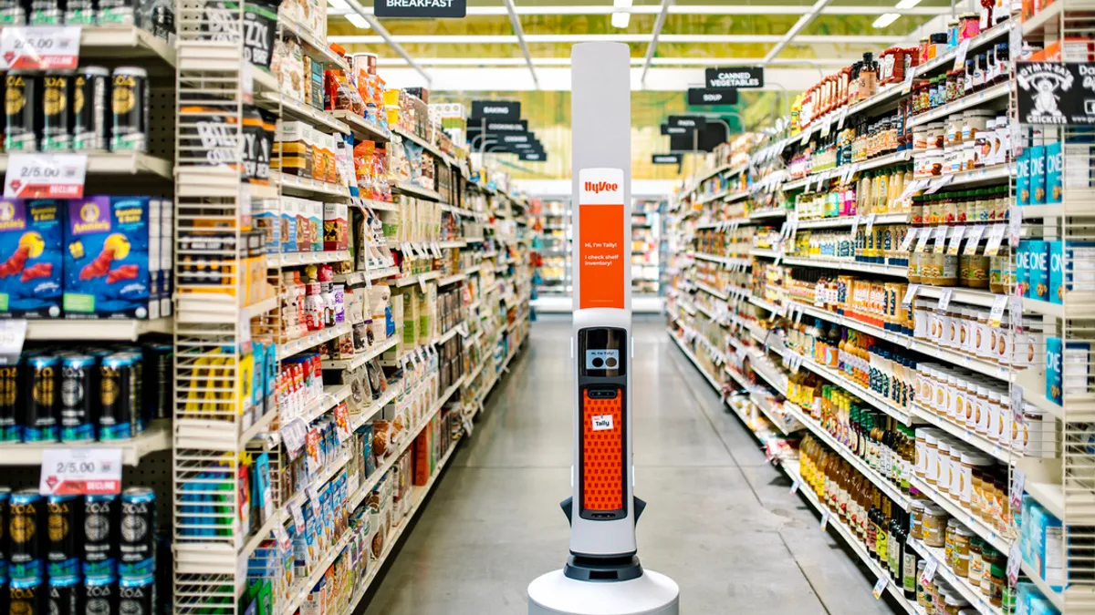 A Tally inventory robot from Simbe Robotics in a Hy-Vee supermarket